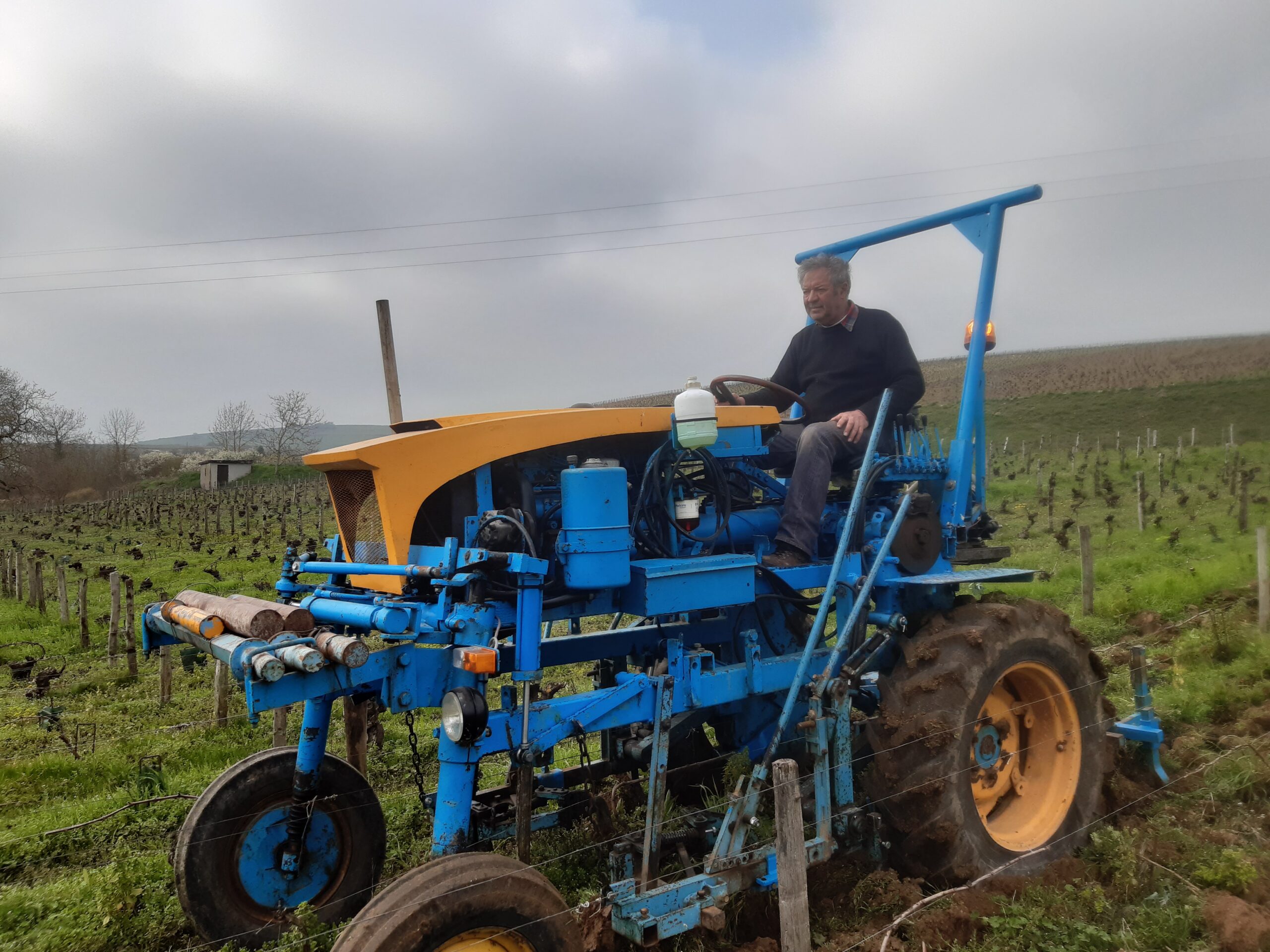 Domaine Merlin Cherrier's Thierry Merlin on his tractor